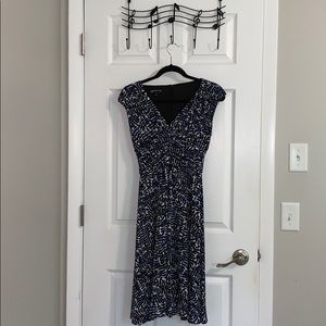 Sophisticated black and navy tea length dress.